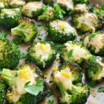 - 1 lb broccoli florets, washed and trimmed - 3 tablespoons extra virgin olive oil - 4 cloves garlic, finely minced - ½ cup freshly grated Parmesan cheese - ½ teaspoon red pepper flakes (optional, for heat) - Salt and freshly ground black pepper to taste - Zest of 1 lemon for brightness - Fresh parsley, chopped, for garnish When choosing your ingredients, fresh is best. For broccoli, look for bright green florets. Avoid yellowing or brown spots. The garlic should be firm with no signs of sprouting. Fresh Parmesan cheese gives the best flavor. Grating it yourself makes a big difference. Use extra virgin olive oil for richness. For measuring, use standard measuring spoons and cups. This ensures your ingredients are just right. Keep your seasonings simple. A pinch of salt and pepper can change the dish. Freshness matters. It enhances taste and nutrition. When you use fresh ingredients, your dish will shine. Don't be shy about experimenting with amounts. Cooking is all about discovering what you love! For the full recipe, check the [Full Recipe]. - Preheating the Oven Start by preheating your oven to 425°F (220°C). This high heat helps the broccoli roast well. A hot oven gives the broccoli nice color and flavor. - Tossing the Broccoli with Ingredients In a big bowl, add 1 lb of washed and trimmed broccoli florets. Drizzle 3 tablespoons of extra virgin olive oil over the florets. Add 4 cloves of finely minced garlic, ½ teaspoon of red pepper flakes (if you want some heat), and salt and freshly ground black pepper to taste. Toss everything together until the broccoli is well coated. - Arranging on a Baking Sheet Take a large baking sheet and transfer the seasoned broccoli onto it. Make sure to spread the florets out in a single layer. This step is key for even roasting. Crowding the pan can make the broccoli steam instead of roast. - Cooking Time and Temperature Place the baking sheet in the preheated oven. Roast the broccoli for about 15 minutes. You want it to be tender and start turning golden brown. Keep an eye on it; you want that perfect roast! - Importance of Single Layer Always roast the broccoli in a single layer. This helps each piece cook evenly and get that nice crispiness. If they are piled up, some pieces will cook too fast, while others may stay soggy. - Adding Parmesan Cheese After 15 minutes, carefully take the baking sheet out. Sprinkle ½ cup of freshly grated Parmesan cheese over the hot broccoli. The cheese will melt and stick nicely to the florets. - Zesting Lemon and Garnishing Put the baking sheet back in the oven for another 5 minutes. Wait until the cheese is melted and bubbly. Once done, take it out and zest a lemon over the dish. This adds a bright, fresh flavor. Finally, sprinkle some fresh parsley on top for color and freshness. You can find the full recipe to make this dish shine! Achieving the Right Texture Roasting broccoli is all about texture. You want it crisp but tender. To get this right, use fresh florets and cut them into similar sizes. This helps them cook evenly. Preheat your oven to 425°F (220°C). This hot temperature gives the broccoli a nice char. Cook for about 15 minutes, then check for doneness. If they are too soft, reduce the time next time. Ensuring Even Cooking Spread the broccoli in a single layer on your baking sheet. Crowding the pan can lead to steaming instead of roasting. Use a large sheet if needed. Toss the broccoli well with olive oil and seasonings. This guarantees that every piece gets coated and cooks evenly. Variations with Herbs and Spices You can mix things up with herbs and spices. Try adding thyme or rosemary for an earthy taste. If you want heat, sprinkle some cayenne or smoked paprika. These flavors can transform your dish. Experiment and see what you like best! Incorporating Other Vegetables Roasted broccoli pairs well with other veggies. Consider adding carrots or bell peppers. Cut them to match the broccoli size. This way, they roast evenly together. You can also add cherry tomatoes for a burst of sweetness. Serving Suggestions Serve your garlic Parmesan roasted broccoli in a shallow bowl. This allows the colors to shine. Add a lemon wedge on the side for a pop of brightness. It looks fresh and inviting. Creative Plating Tips For a fun touch, drizzle a bit of extra olive oil over the top. You can also sprinkle some more Parmesan cheese before serving. This gives a nice finishing touch. Use fresh parsley for a vibrant, green contrast. A well-presented dish makes it even more appealing. For the full recipe, follow the steps and enjoy this delightful side! {{image_4}} You can switch up the cheese to suit your taste. Here are some great options: - Pecorino Romano - Grana Padano - Asiago - Feta Each cheese brings its own flavor. Pecorino Romano adds a sharp bite, while Grana Padano is milder. You can also mix cheeses for extra depth. Try feta for a creamy contrast. Add fun flavors to the dish. Try these combinations: - Lemon zest with capers - Balsamic glaze with honey - Smoked paprika for a smoky touch Experiment with spices and herbs. For a kick, add chili powder or cumin. Use fresh herbs like basil or thyme for a fresh twist. Want to make this dish a full meal? Add protein! Some tasty suggestions include: - Grilled chicken - Shrimp - Tofu Grilled chicken pairs well with the garlic and cheese. Shrimp adds a lovely seafood flavor. For a plant-based option, try marinated tofu. Cook the protein separately and serve it alongside or mixed in. If you're vegan, you can still enjoy this dish! Replace the cheese with: - Nutritional yeast - Vegan cheese Nutritional yeast gives a cheesy flavor without dairy. Vegan cheese can melt just like regular cheese. Look for brands that taste good on their own. For a creamy touch without dairy, use: - Cashew cream - Almond cream These creams add richness. You can make them by blending soaked nuts with water. They add a silky texture to your roasted broccoli. For the full recipe, check the Garlic Parmesan Roasted Broccoli section above. Enjoy these tasty variations! How do you store leftovers? First, let the broccoli cool down. Place it in an airtight container. This keeps it fresh. You can safely store it in the fridge for up to three days. If you want to keep it longer, consider freezing it. What are proper containers? Use glass or plastic containers with tight lids. These help prevent moisture loss. Make sure the container is clean before adding the broccoli. What are the best practices for reheating? The best way to reheat broccoli is in the oven. Preheat your oven to 350°F (175°C). This keeps the broccoli crisp. Spread it out on a baking sheet. Heat it for about 10 minutes. How do you maintain crunchiness? Avoid using the microwave if you want crunch. The oven helps keep that great texture. You can also use a skillet on medium heat. Just stir for a few minutes until warm. How can you freeze for long-term storage? Start by blanching the broccoli. Boil it for two minutes, then cool it in ice water. Drain and pat dry. Place it in a freezer bag. Squeeze out the air and seal it well. This way, it can last up to six months. How do you thaw and prepare from frozen? To thaw, place the bag in the fridge overnight. You can also use the microwave on the defrost setting. After thawing, you can roast or sauté it. This will bring back some crunch. For best results, cook it straight from frozen. Roasting broccoli usually takes about 20 minutes. You first cook it for 15 minutes. Then, you add cheese and let it roast for another 5 minutes. This time gives the broccoli a nice texture and flavor. Yes, you can use frozen broccoli. However, fresh broccoli works best for this recipe. Frozen broccoli may not get as crispy. If using frozen, thaw and drain it well before roasting. Garlic Parmesan roasted broccoli pairs well with many dishes. I like serving it with grilled chicken or fish. It also complements pasta dishes and can be a great side for steak. Yes, this recipe is gluten-free. It contains no bread or grains. Just check your Parmesan cheese to ensure it’s gluten-free. Most brands are safe, but it’s good to confirm. To spice things up, add red pepper flakes. You can also use spicy garlic powder. If you want more heat, try adding sliced jalapeños before roasting. Yes, you can prep the broccoli in advance. Toss it with oil and garlic, then store it in the fridge. Just roast it when you’re ready to serve. If you need to replace olive oil, try using avocado oil. It has a similar flavor and is healthy. You can also use melted butter for a richer taste. You learned how to make tasty Garlic Parmesan Roasted Broccoli. We covered key ingredients, cooking steps, and tips for perfect results. You also discovered tasty variations and how to store leftovers. This dish is easy and fun to make. It’s a great side for any meal, whether you want it vegan or with protein. Use the tips to impress your family and friends. Now, enjoy your delicious broccoli and get creative in the kitchen!