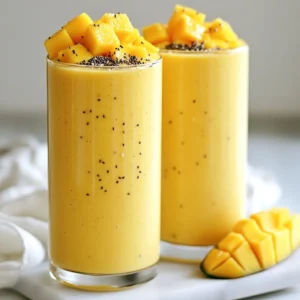 - 1 ripe mango, peeled, pitted, and diced - 1 cup coconut milk (canned or carton) - 1/2 cup Greek yogurt (or dairy-free alternative) - 1 banana, peeled and sliced - 1 tablespoon honey or agave syrup - 1/2 teaspoon pure vanilla extract - 1/2 cup ice cubes - Optional: 1 tablespoon chia seeds To make a creamy coconut mango smoothie, you need fresh and simple ingredients. First, choose a ripe mango. It should feel soft but not mushy. A ripe mango gives the best flavor. Next, grab some coconut milk. You can use canned coconut milk for a rich taste or carton coconut milk for a lighter feel. Greek yogurt adds creaminess and protein. If you're vegan, you can use a dairy-free yogurt. A banana brings natural sweetness and a smooth texture. Honey or agave syrup helps adjust sweetness to your liking. The pure vanilla extract enhances the flavor, making it even more delightful. Don't forget the ice cubes! They chill your smoothie and make it refreshing. If you want a boost of nutrition, add chia seeds. They are tiny but packed with goodness. With these ingredients, you're ready to blend up a delicious and creamy coconut mango smoothie! {{ingredient_image_2}} 1. Start by peeling and pitting the ripe mango. Dice it into small pieces. You want them to be bite-sized for easy blending. 2. Next, peel the banana and slice it into rounds. This helps it blend smoothly. 3. Measure out one cup of coconut milk. You can choose canned for a rich taste or carton for a lighter feel. 4. Scoop half a cup of Greek yogurt, or use a dairy-free option if you prefer. 1. In a blender, combine the diced mango, coconut milk, Greek yogurt, and sliced banana. 2. Add one tablespoon of honey or agave syrup for sweetness. You can adjust this to taste later. 3. Pour in half a cup of ice cubes to make it cool and refreshing. 4. If you want to boost nutrition, include one tablespoon of chia seeds. 1. Blend on high speed until everything is smooth and creamy. 2. Stop the blender and scrape down the sides if needed. This helps mix all the ingredients well. 3. Taste your smoothie. If you want it sweeter, add more honey or agave. Blend again briefly to mix. 4. Once it's perfect, pour the smoothie into tall glasses. Enjoy your delicious creation! To get a silky-smooth texture, use a high-speed blender. Start by blending on medium speed. Once mixed, switch to high speed. This helps everything blend evenly. If you notice chunks of fruit, it&rsquo;s time to scrape down the sides. Use a spatula to push the ingredients toward the blades. This ensures all pieces mix well. Pour your smoothie into tall glasses for a nice look. For garnish, add a slice of fresh mango on the rim. You can also sprinkle a few chia seeds on top. A fresh mint leaf adds a pop of color and scent. Serve right after blending to keep it cold and fresh. Taste your smoothie after blending. If you want it sweeter, add more honey or agave syrup. Start with a small amount and blend again. You can also substitute honey with maple syrup or stevia for a different flavor. Adjusting sweetness helps make the smoothie perfect for your taste. Pro Tips Choose the Right Mango: For the best flavor, select a ripe mango that yields slightly to pressure when gently squeezed. This ensures natural sweetness and creaminess in your smoothie. Customize Your Sweetness: Remember that the ripeness of your fruit can affect the sweetness of your smoothie. Start with less honey or agave and adjust according to your taste preferences. Chill Your Ingredients: For an extra refreshing smoothie, chill your mango and banana beforehand, or use frozen banana slices instead of ice cubes for a creamier texture. Add a Protein Boost: To make your smoothie more filling, consider adding a scoop of protein powder or a tablespoon of nut butter, which complements the flavors beautifully. {{image_4}} You can switch up the fruit in your smoothie. Try adding pineapple or berries. Pineapple gives a sweet and tangy kick. Berries add a burst of color and flavor. Mixing different fruits creates a fun tropical blend. You can even use frozen fruits to keep it cold and thick. If you're vegan, you can swap out Greek yogurt. Use dairy-free yogurt made from almond or coconut. This keeps your smoothie creamy and delicious. For milk, choose almond or oat milk for a light option. These alternatives still keep the smoothie tasty and smooth. Want a different texture? You can add oats or protein powder. Oats make your smoothie more filling. Protein powder boosts the nutrition and helps with muscle recovery. You can also change the amount of ice. More ice makes your smoothie thicker. Less ice gives it a thinner, drinkable feel. Enjoy experimenting to find what you like best! To store leftover smoothie, use an airtight container. Glass jars work well, but plastic containers are fine too. Make sure to seal it well to keep air out. The smoothie stays fresh for up to 24 hours in the fridge. After that, the texture and taste may change. You can freeze smoothie ingredients for quick blending later. Chop fruits like mango and banana before freezing. Place them in freezer bags and label the bags with the date. For yogurt, scoop it into ice cube trays and freeze. This makes it easy to pop out just what you need later. To re-blend stored smoothie, pour it back into the blender. If it's too thick, add a splash of coconut milk. Blend until smooth again. Keep in mind that the texture may be different after freezing. It might be a bit thicker or grainy. Adding a little ice can help revive that creamy feel. Yes, you can easily make this smoothie vegan. To do this, substitute Greek yogurt with a dairy-free yogurt. Many brands offer coconut or almond yogurt that works well. For sweetness, replace honey with agave syrup or maple syrup. Both options will keep your smoothie sweet and delicious without using animal products. If you don't have coconut milk, don't worry! You can use other types of milk. Almond milk or oat milk are great alternatives. Both will change the flavor slightly, but they will still taste good. Choose unsweetened versions to keep the smoothie balanced, and add a little more banana if you want more creaminess. To make a thicker smoothie, adjust the ingredient ratios. Use less coconut milk or add more frozen banana and ice cubes. Chia seeds can also help thicken the smoothie. If you want to add nutrients, mix in some oats or protein powder. These tips will help you enjoy a creamy and thick smoothie every time! This blog post covered how to make a tasty smoothie using simple ingredients. We discussed the main and additional ingredients, like mango, coconut milk, and yogurt. I shared step-by-step instructions to blend and achieve the best texture. We explored tips for serving and adjusting sweetness. You can even customize your smoothie with different fruits and storage methods. Remember, smoothies can be healthy and fun. Get creative with your own blend and enjoy!
